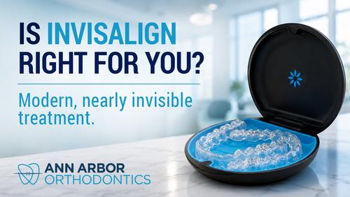 Open Invisalign aligner case displaying clear aligners, illustrating the removable clear aligner treatment offered by Ann Arbor Orthodontics.
